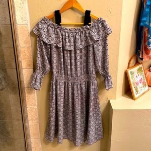 Cold-shoulder dress with bell sleeves.